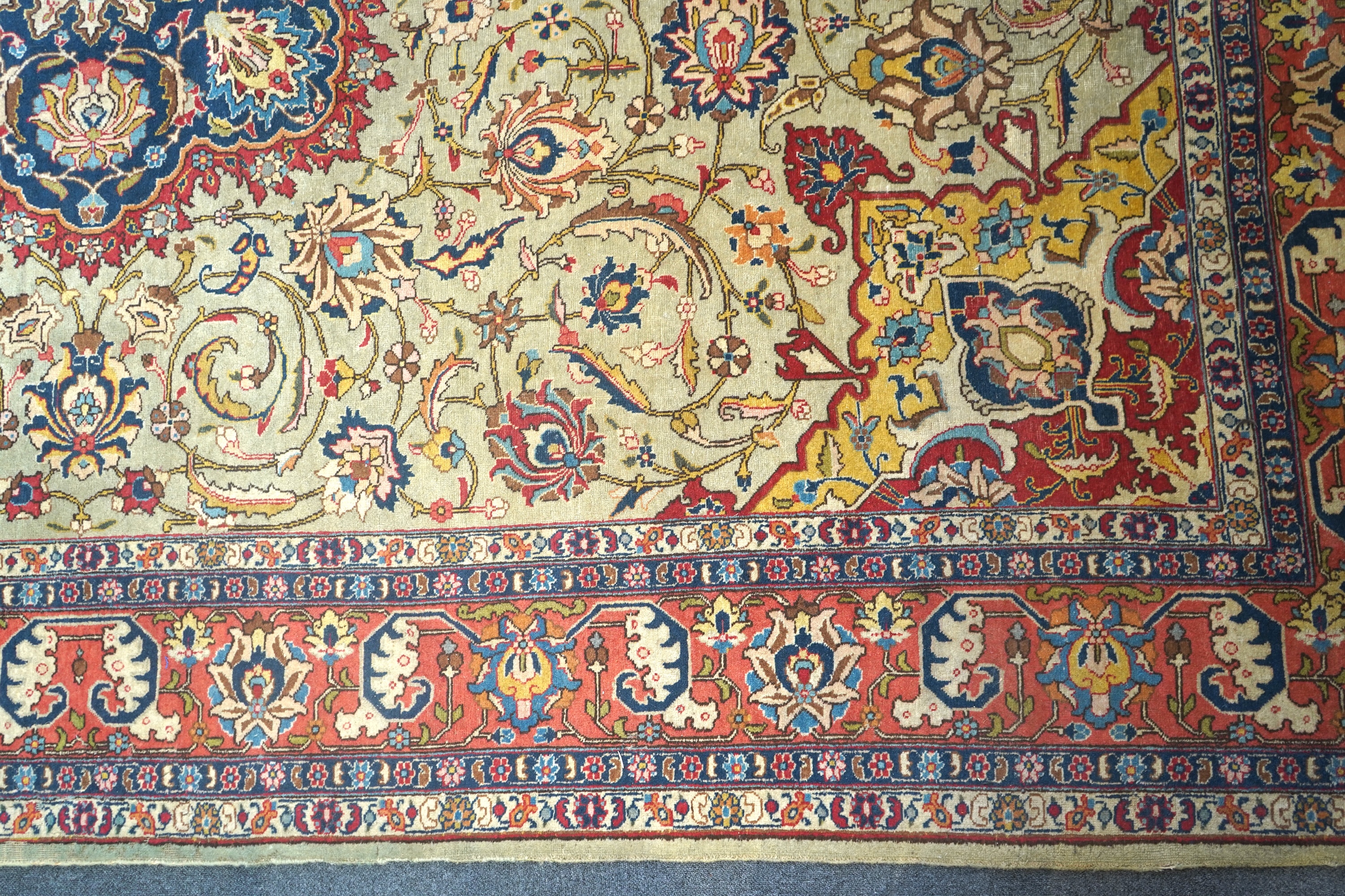 An early 20th century Tabriz pale green ground carpet